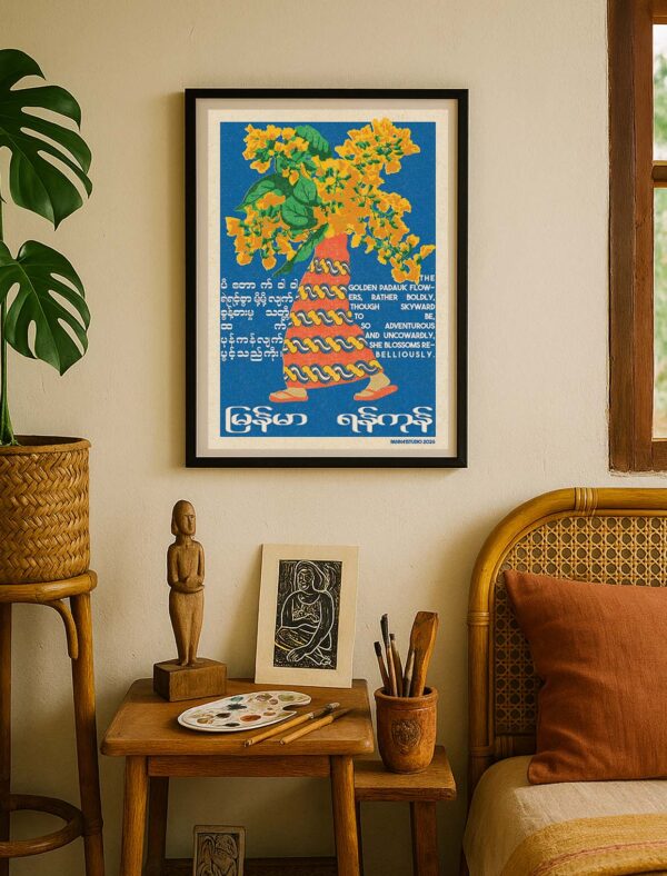 Walking Padauk poster displayed in a frame within a Myanmar-inspired interior celebrating traditional colours and floral motifs.
